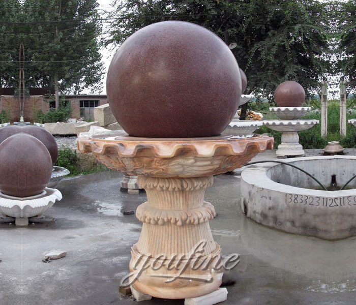 Outdoor park casting red granite stone rotating fengshui ball fountains for sale